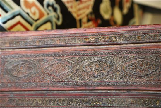 A Tibetan carved panel, 18th/19th century, 72.5cm x 24cm